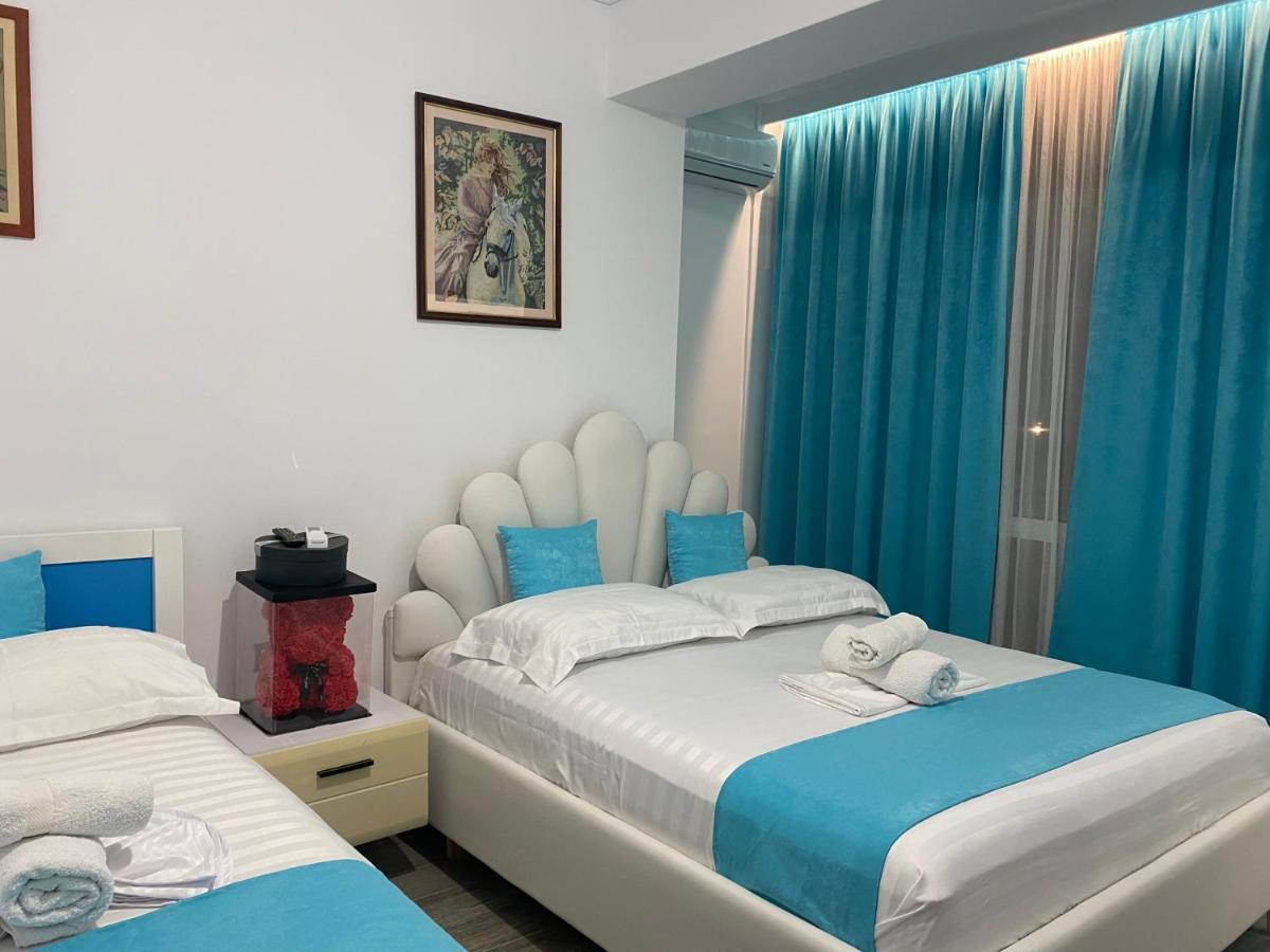 Vila Sinani Sarande Bagian luar foto